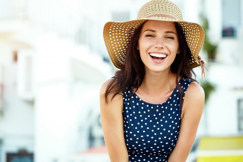 woman smiling in her summer clothes